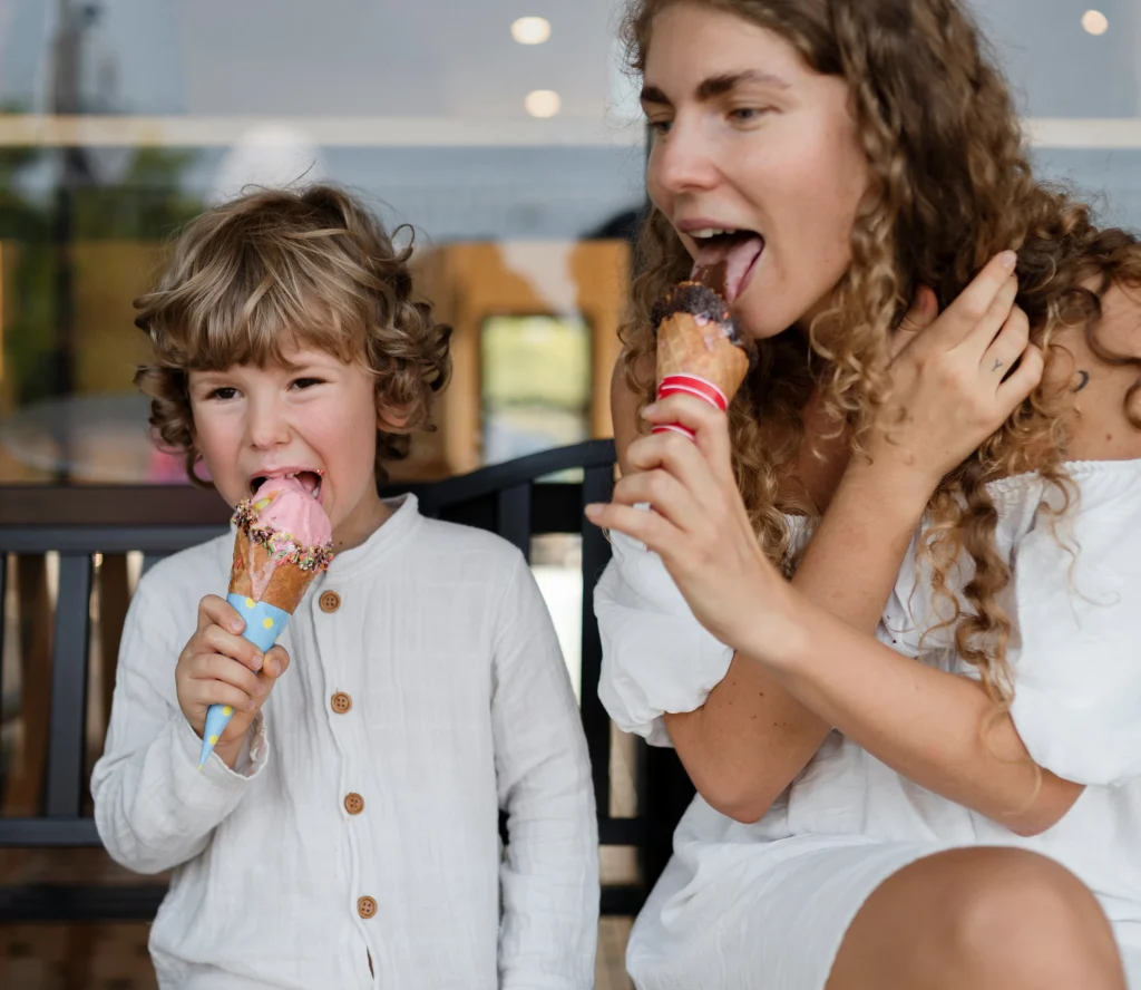 Mom and child eat ice cream